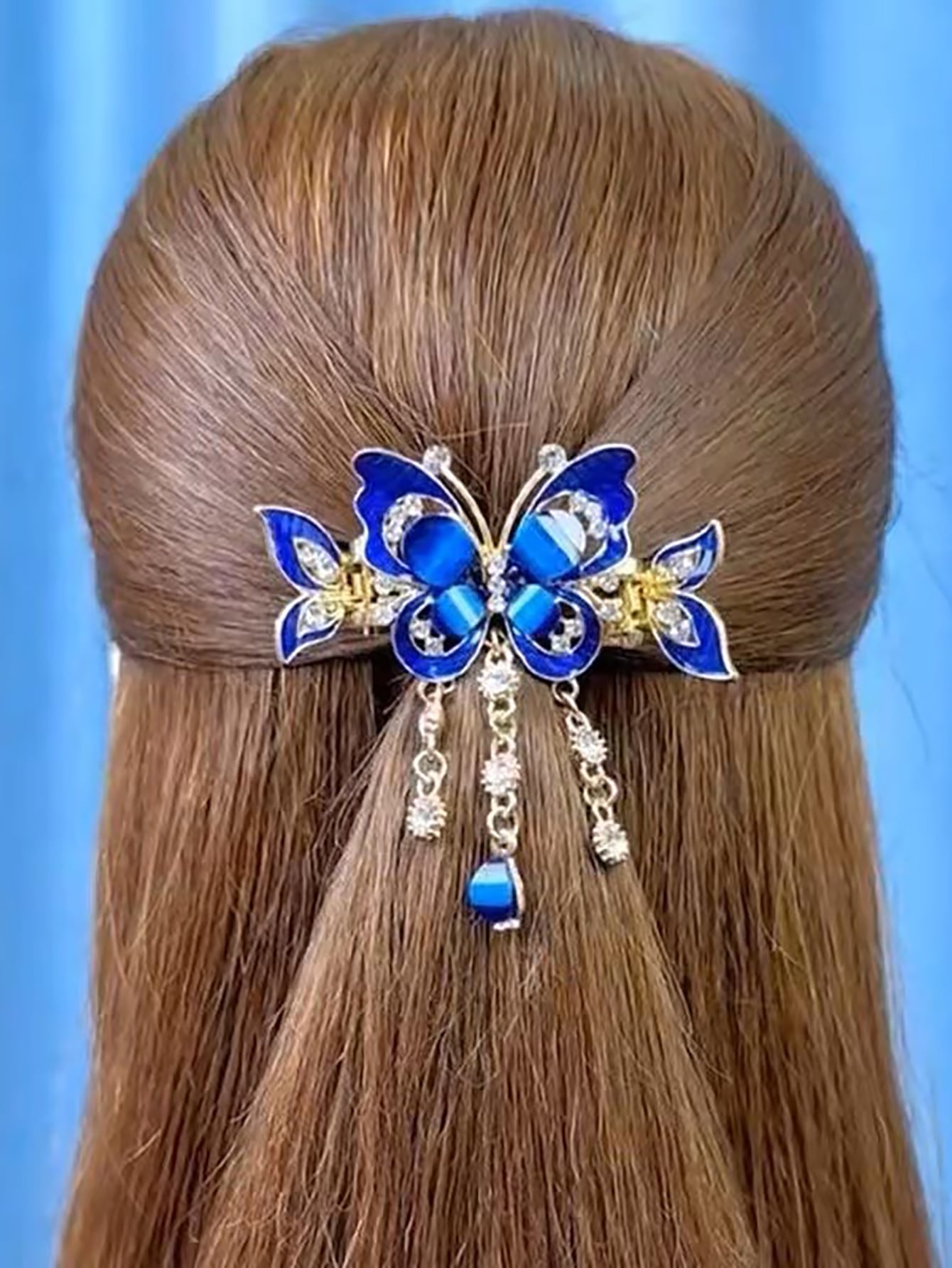 Pinza para el cabello de lujo con diseño de mariposa y diamantes de imitación