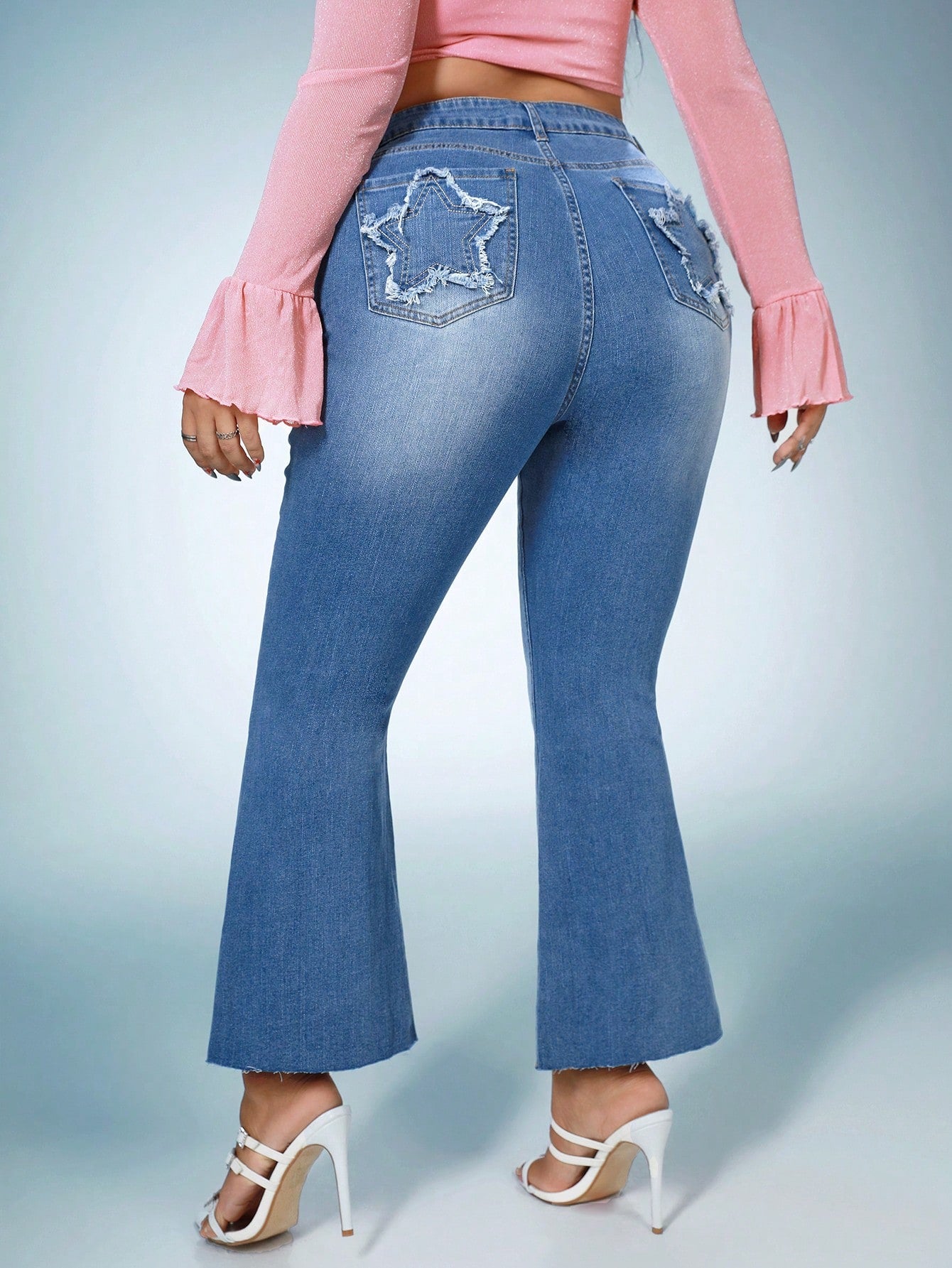 Plus* She’s a Star Embroidery Raw Hem Flare Leg Jeans